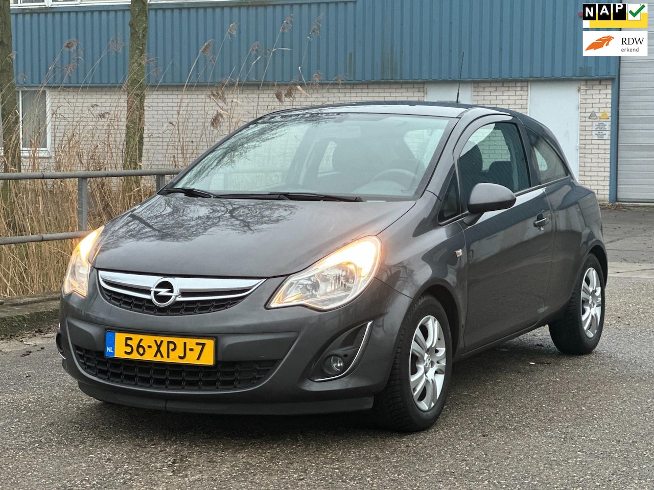 Opel Corsa - 1.4-16V Anniversary Edition NAVI! Airco! NAP! APK! - AutoWereld.nl