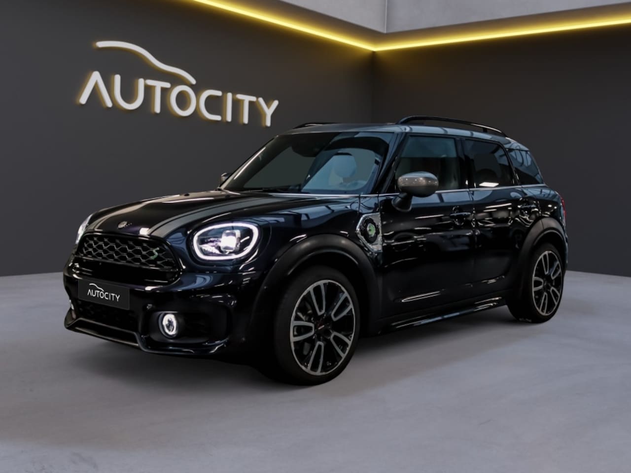 MINI Countryman - Mini 2.0 PHEV Cooper S E ALL4 JCW Pano l Leder l Memory l Harman l VO - AutoWereld.nl