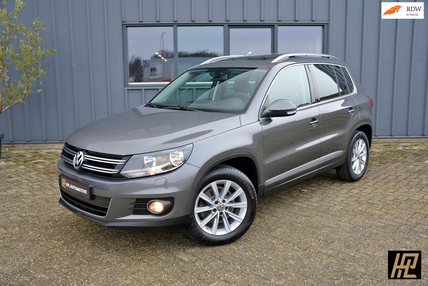 Volkswagen Tiguan - 1.4 TSI 150pk Sport & Style - AutoWereld.nl