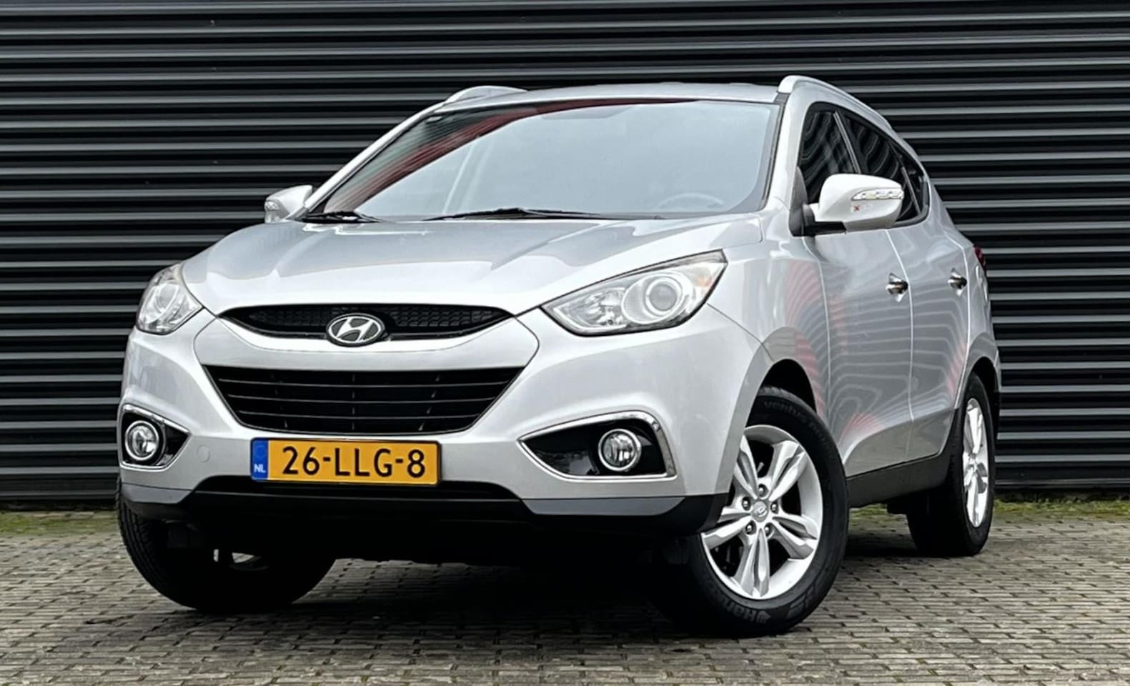 Hyundai ix35 - 2.0i Style | Navigatie | Airconditioning | Trekhaak | Cruise control | 17'' Lichtmetalen v - AutoWereld.nl