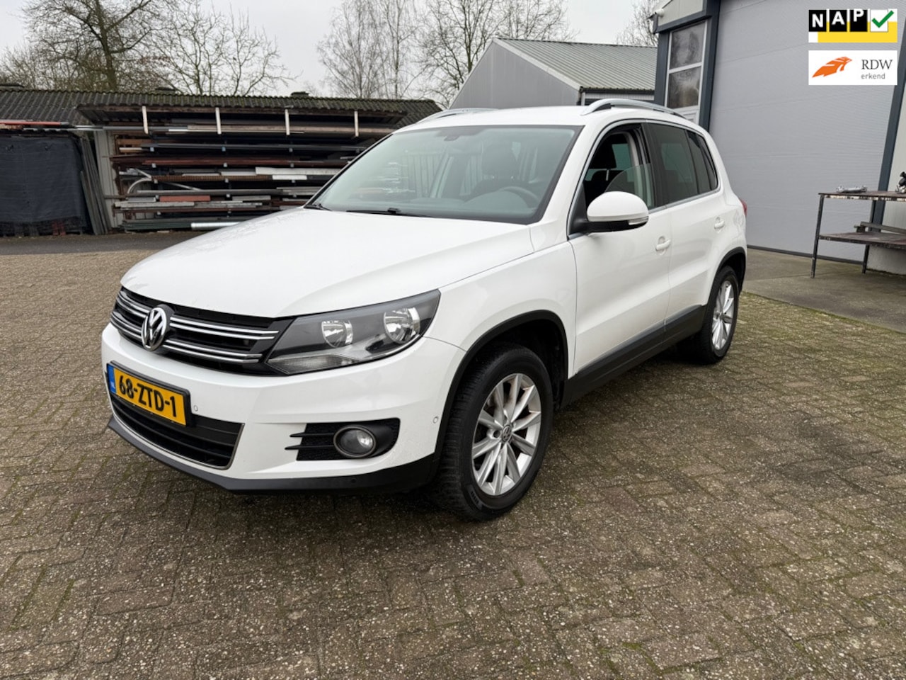 Volkswagen Tiguan - 1.4 TSI Sport&Style NWE APK** ZEER NETJES!! - AutoWereld.nl