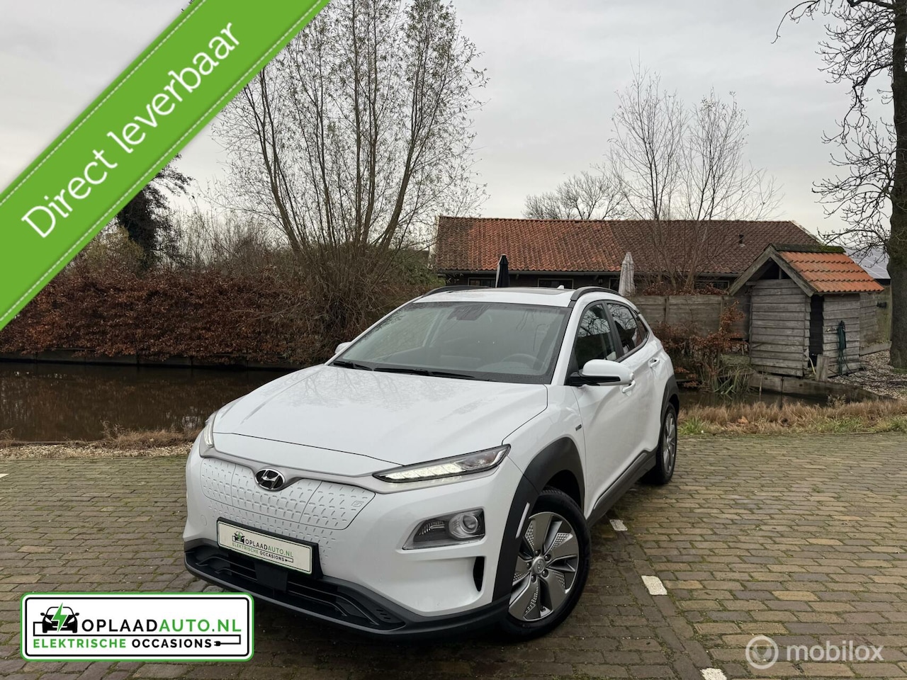 Hyundai Kona Electric - EV 64 Style | Schuifdak | 3 Fase | Trekhaak - AutoWereld.nl