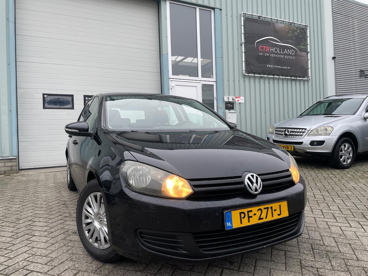 Volkswagen Golf - 1.4 Easyline (bj 2009) NAVI|PDC|AIRCO|CARPLAY - AutoWereld.nl