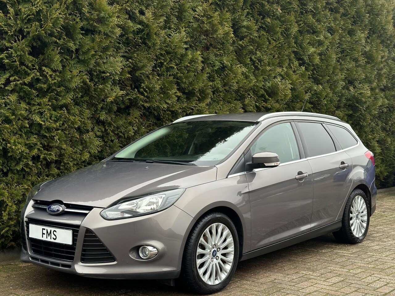 Ford Focus Wagon - 1.0 EcoBoost Titanium Navigatie - AutoWereld.nl