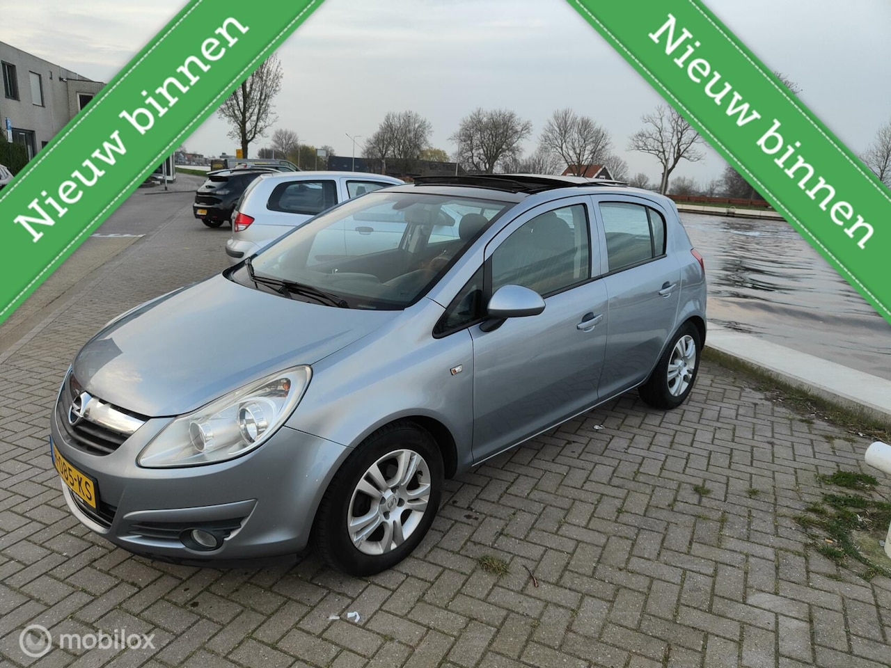 Opel Corsa - 1.2-16V Selection 1.2-16V Selection - AutoWereld.nl