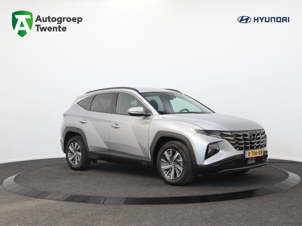 Hyundai Tucson - 1.6 T-GDI HEV Comfort Smart Hybride | Airco | Navigatie | Carpla - AutoWereld.nl