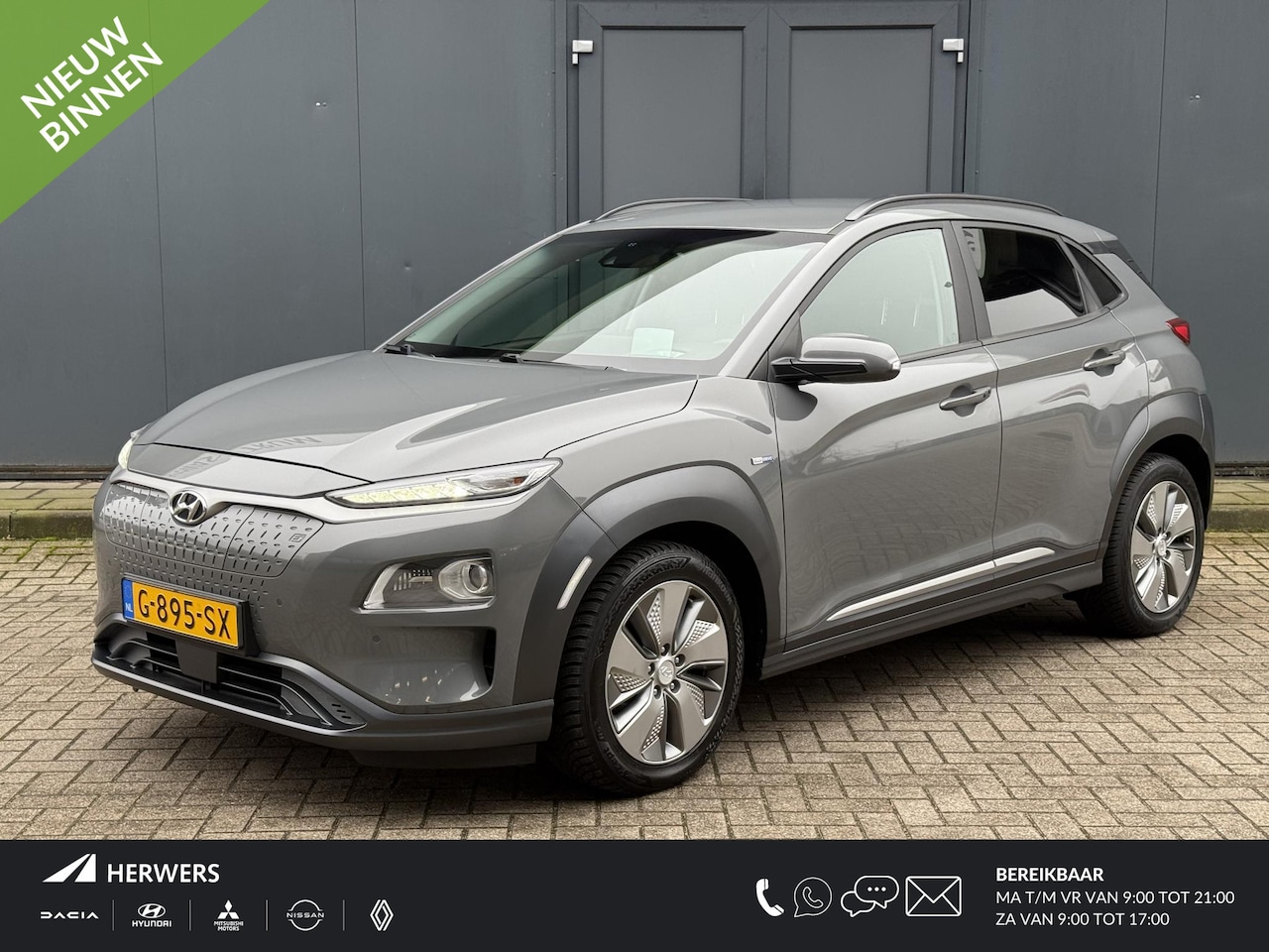 Hyundai Kona Electric - EV Premium 64 kWh / Afneembare Trekhaak / Stoelverwarming / Stoelverkoeling / Stuurverwarm - AutoWereld.nl