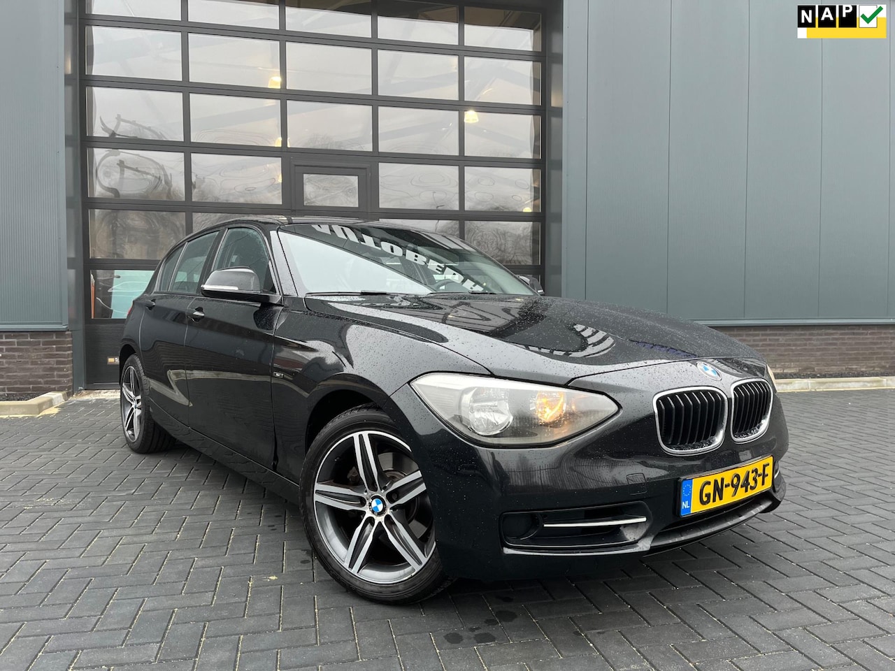 BMW 1-serie - 118i Sport 170Pk/Navigatie/Leder/Nieuwe Apk - AutoWereld.nl