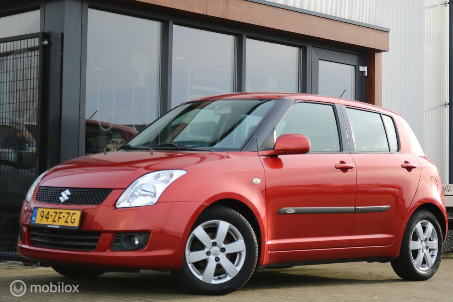 Suzuki Swift - 1.3 Comfort | Airco | lm velgen | 5drs - AutoWereld.nl