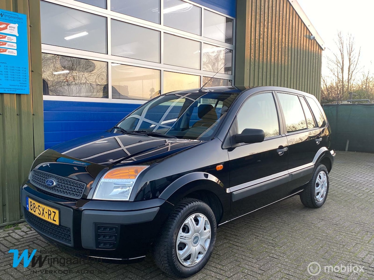 Ford Fusion - 1.4-16V Comfort|Keurige auto|Airco|Trekhaak - AutoWereld.nl