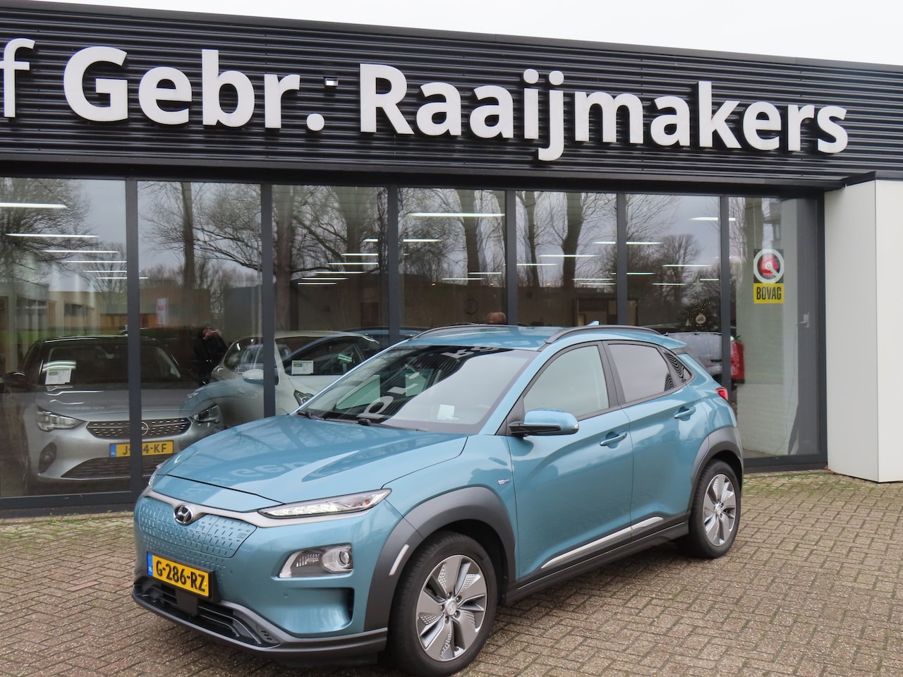 Hyundai Kona Electric - EV Premium 64 kWh*Leder*Navigatie*EXPORTPRIJS* - AutoWereld.nl