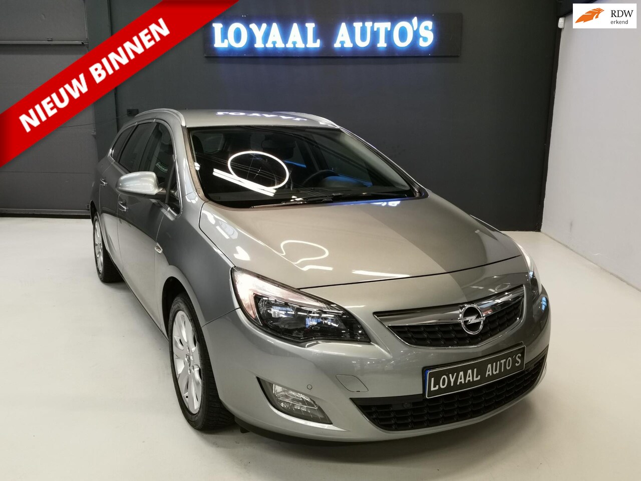 Opel Astra Sports Tourer - 1.4 Turbo Edition | AUT | NAVI | AIRCO | CRUISE | PDC | STOEL.VERW | APK. - AutoWereld.nl