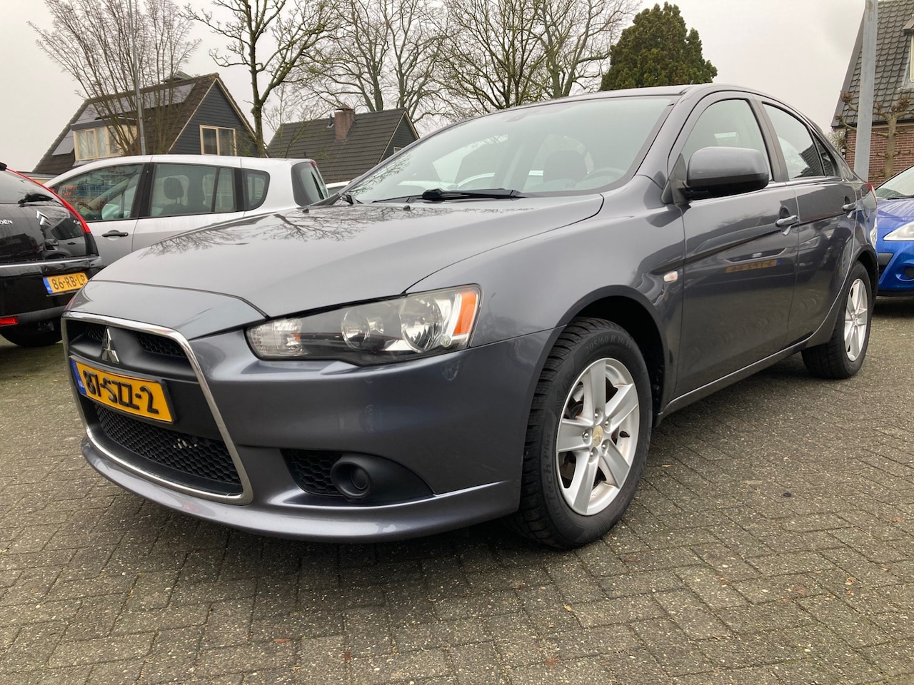 Mitsubishi Lancer Sportback - 1.5 Edition One 80kW-110pk,Airco,Elek-pakket,Nap 5199,- - AutoWereld.nl