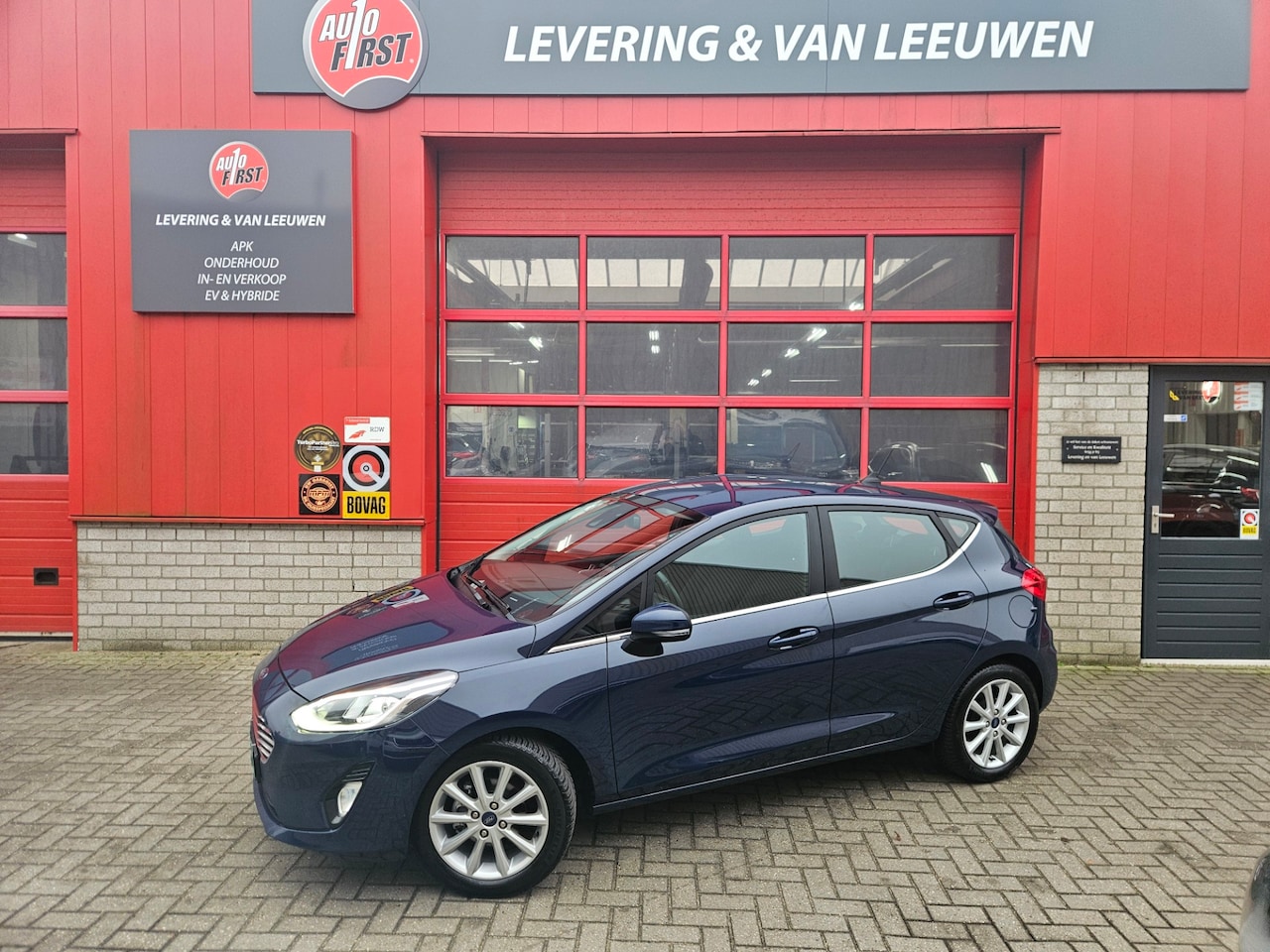 Ford Fiesta - 1.0 EcoBoost Titanium LM velgen/ Navigatie/ 1ste eigenaar/ Rijklaarprijs! - AutoWereld.nl