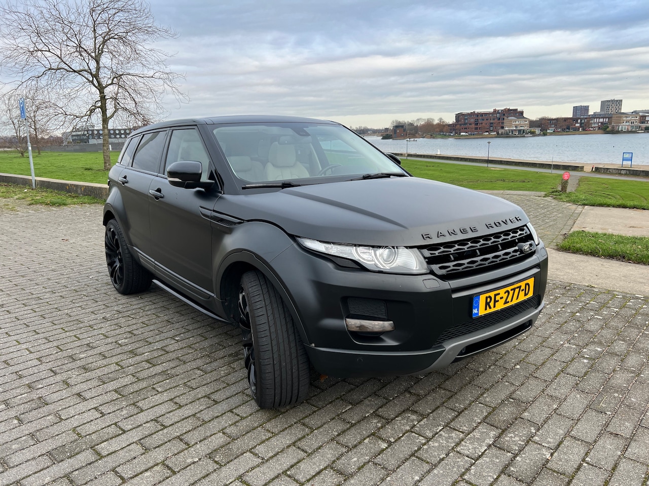 Land Rover Range Rover Evoque - 2.2 SD4 4WD Sicilian Yellow - AutoWereld.nl