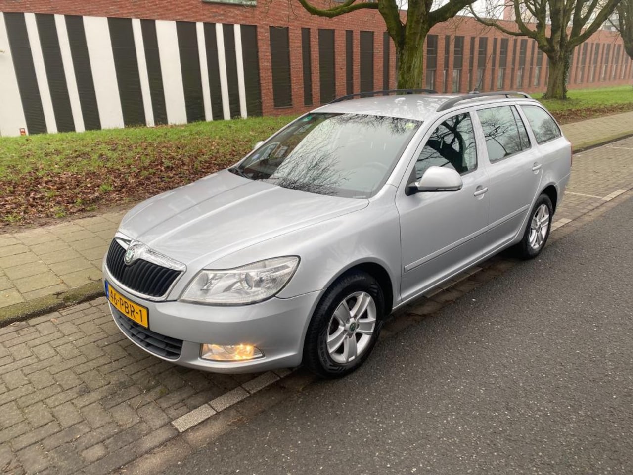 Skoda Octavia Combi - 1.2 TSI Ambition Business Line MET NAVIGATE EN CLIMA - AutoWereld.nl