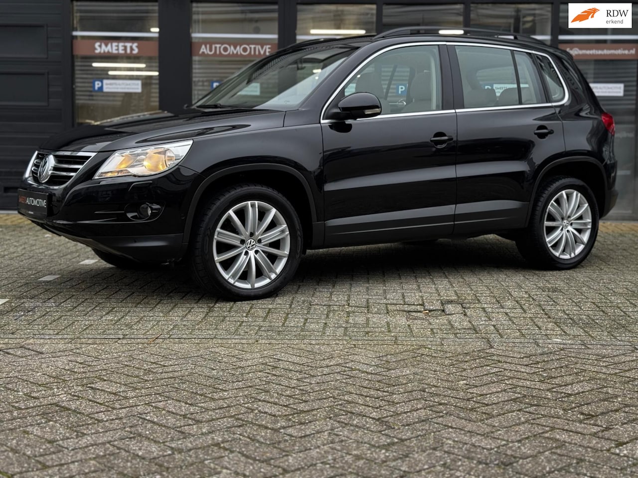 Volkswagen Tiguan - 2.0 TSI Sport&Style 4Motion,Automaat,Pano,Navi - AutoWereld.nl