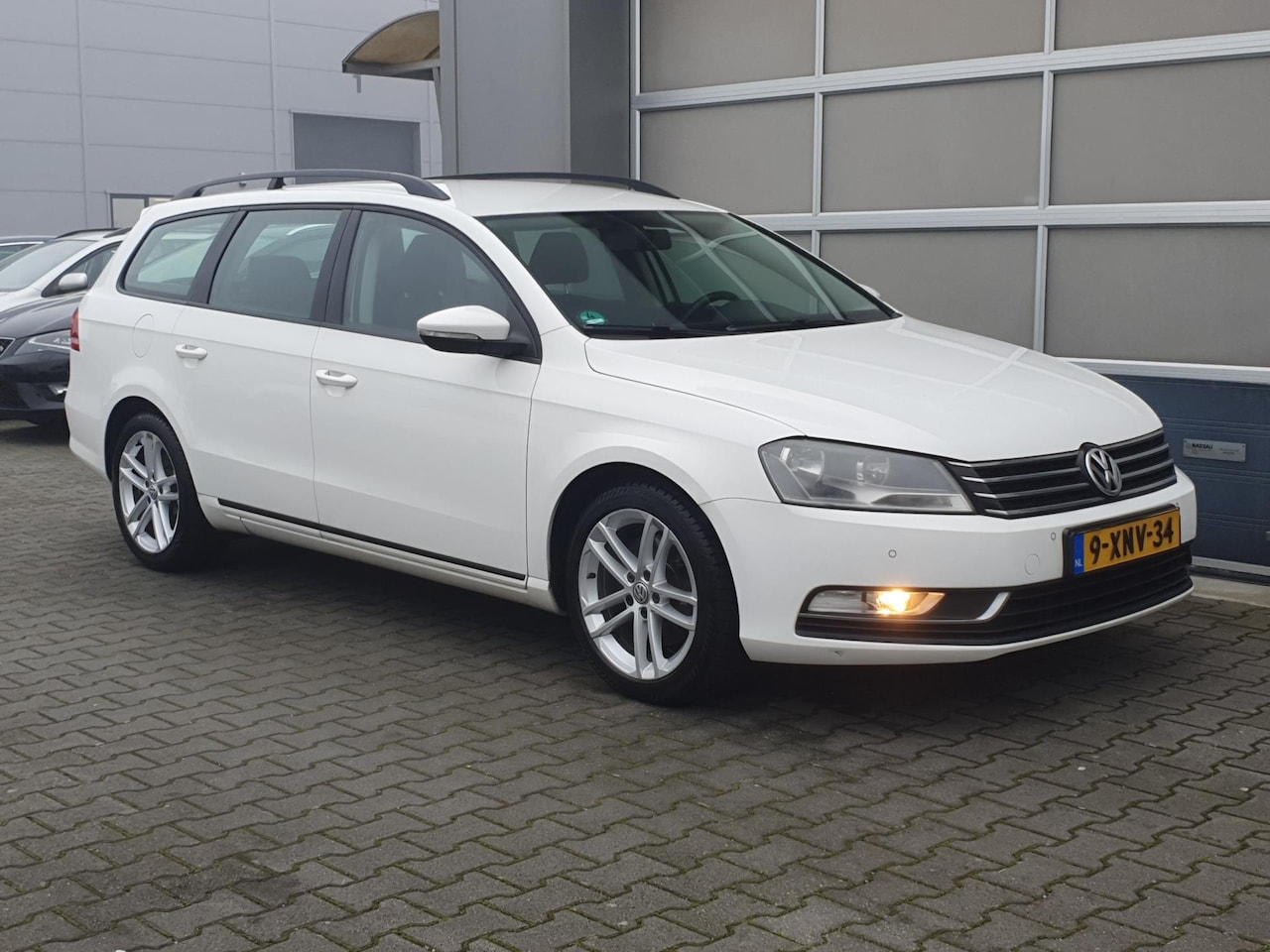 Volkswagen Passat Variant - 1.6 TDI BlueMotion Clima/Cruise/PDC/Navi!! - AutoWereld.nl