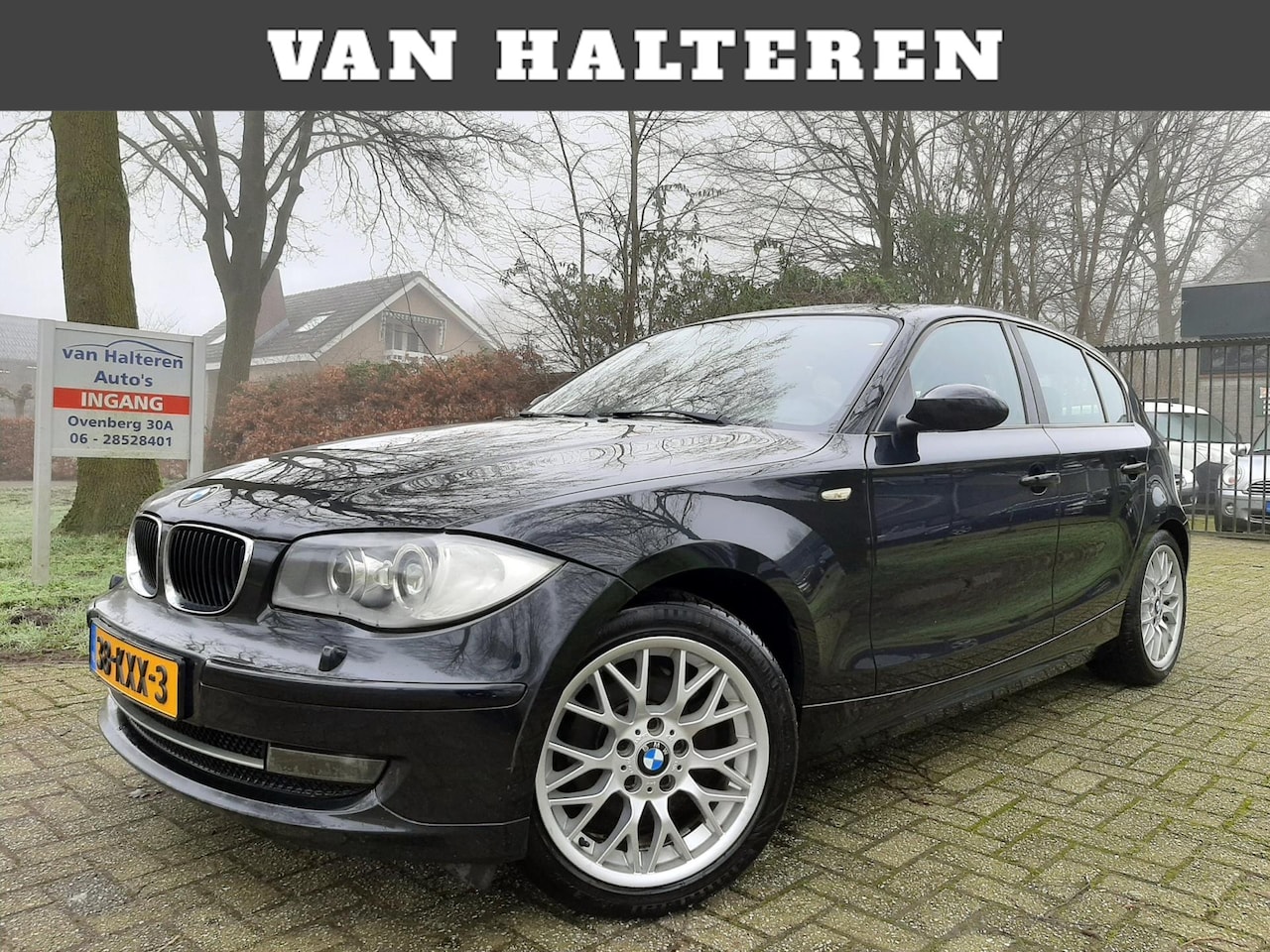 BMW 1-serie - 118i Airco Xenon Navigatie Cruise Control - AutoWereld.nl