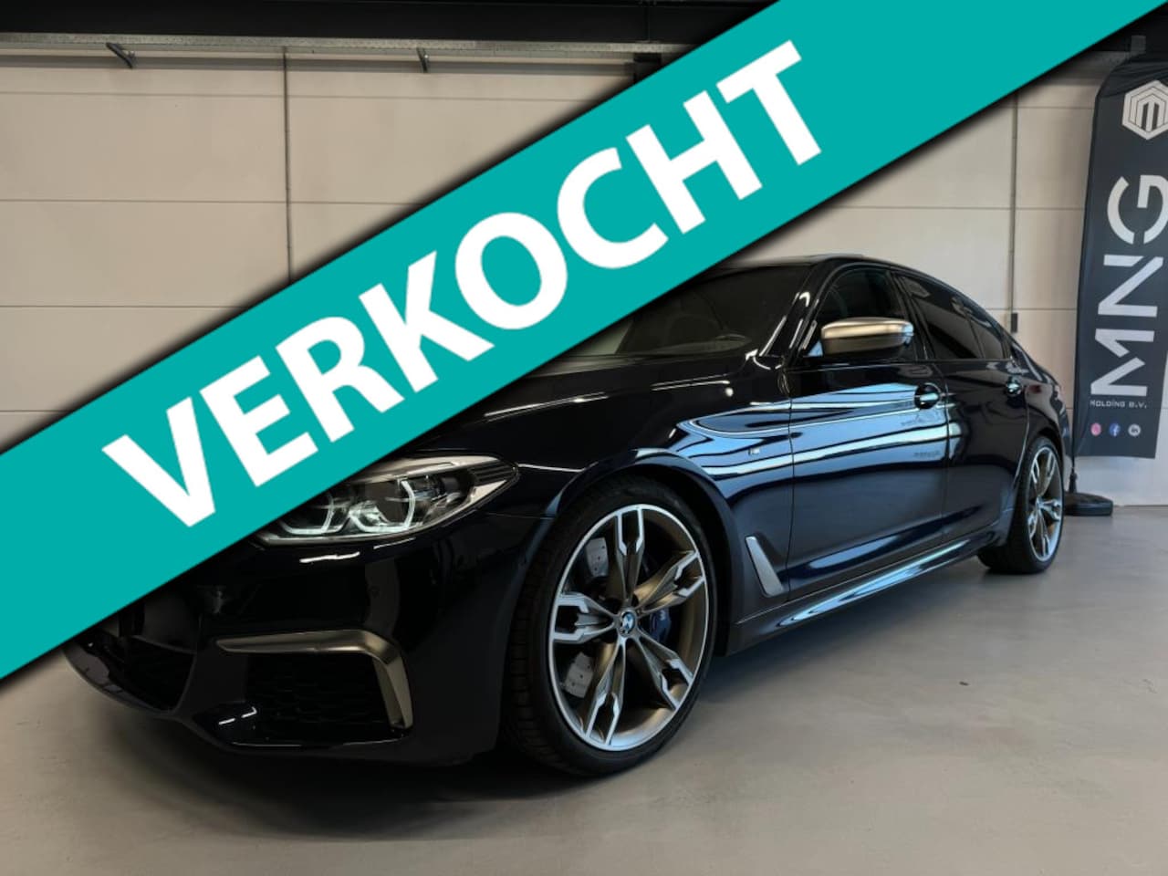 BMW 5-serie - M550i xDrive High Executive|Pano|ACC|StKoeling| - AutoWereld.nl