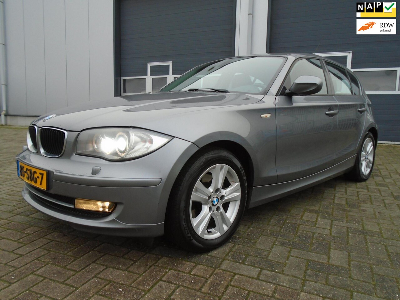 BMW 1-serie - 118d Business Line Ultimate Edition navi leer xenon voll optie,s - AutoWereld.nl