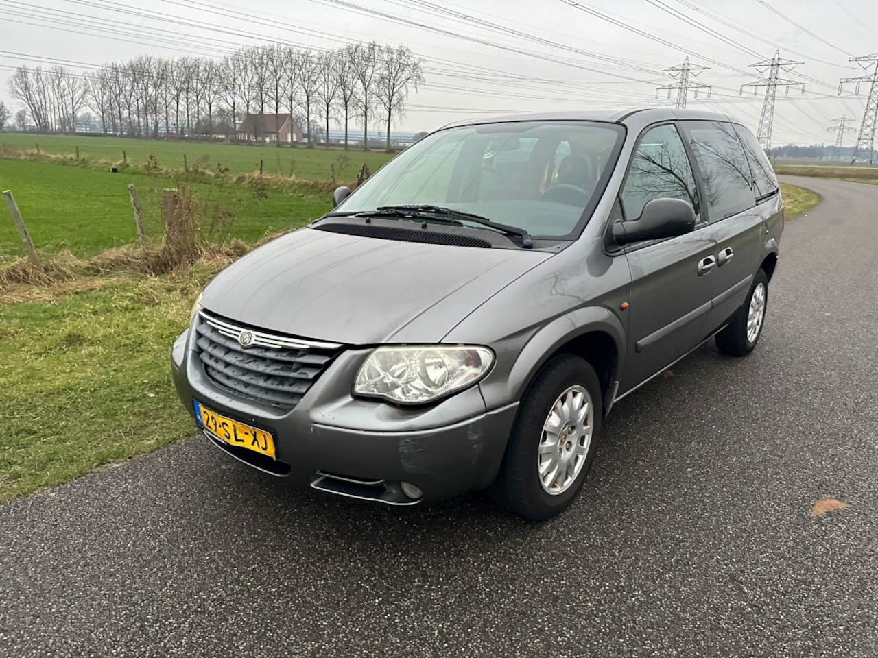 Chrysler Voyager - 3.3i V6 SE Luxe 3.3i V6 SE Luxe - AutoWereld.nl