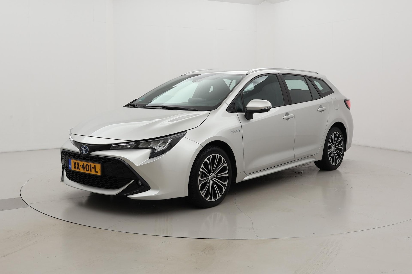 Toyota Corolla Touring Sports - 1.8 Hybrid First Edition | Trekhaak | Navigatie - AutoWereld.nl