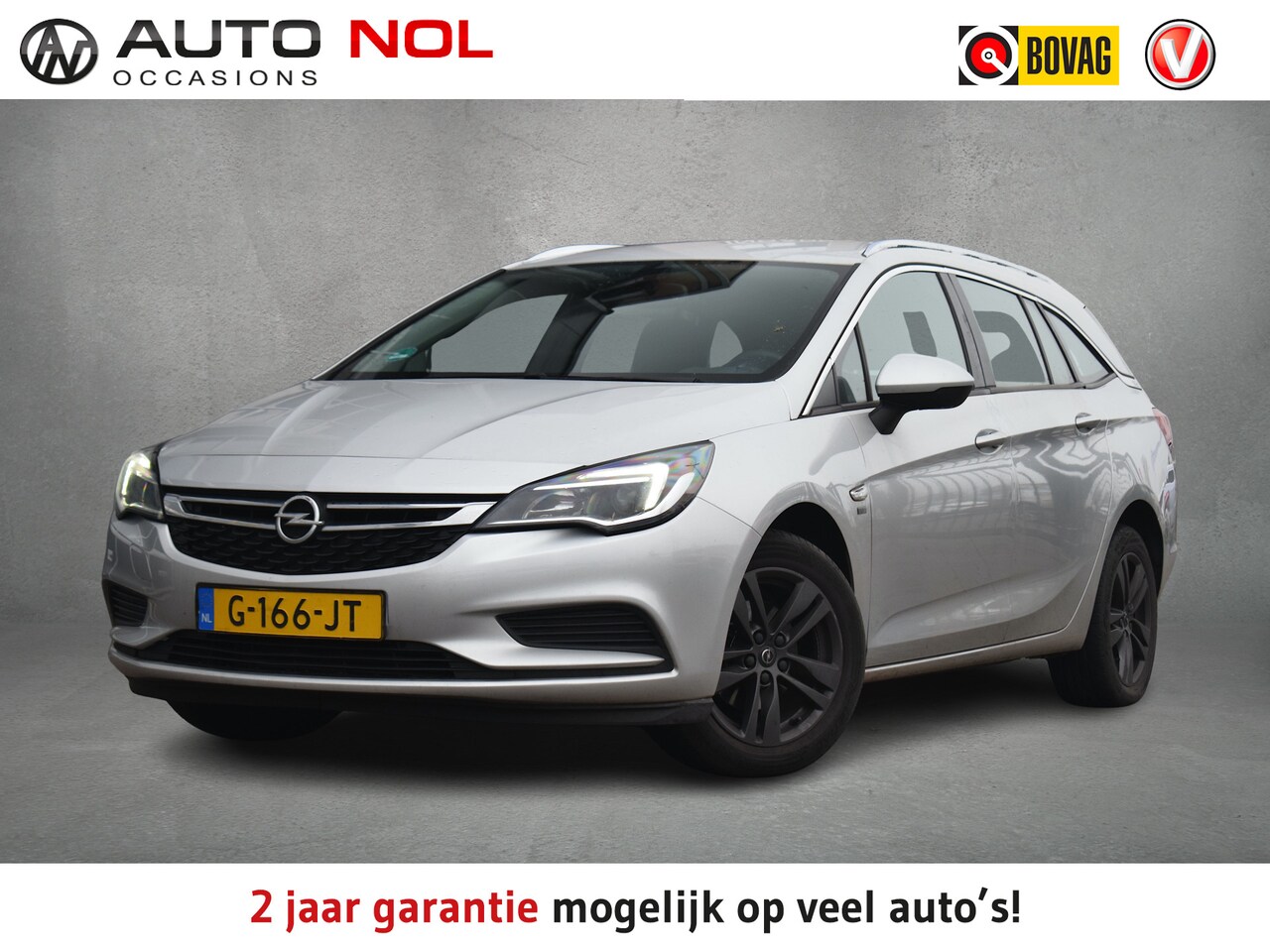 Opel Astra Sports Tourer - 1.0 Turbo 120 Jaar Edition | Navi | Cruise | Airco | Elektrische Ramen - AutoWereld.nl