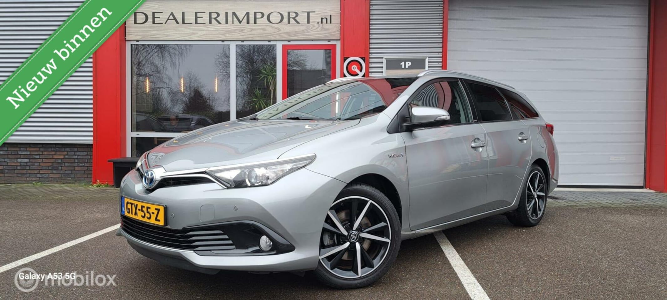 Toyota Auris Touring Sports - 1.8 Hybrid Edition S+ / ECC / NAVI / Cruisecontrol - AutoWereld.nl