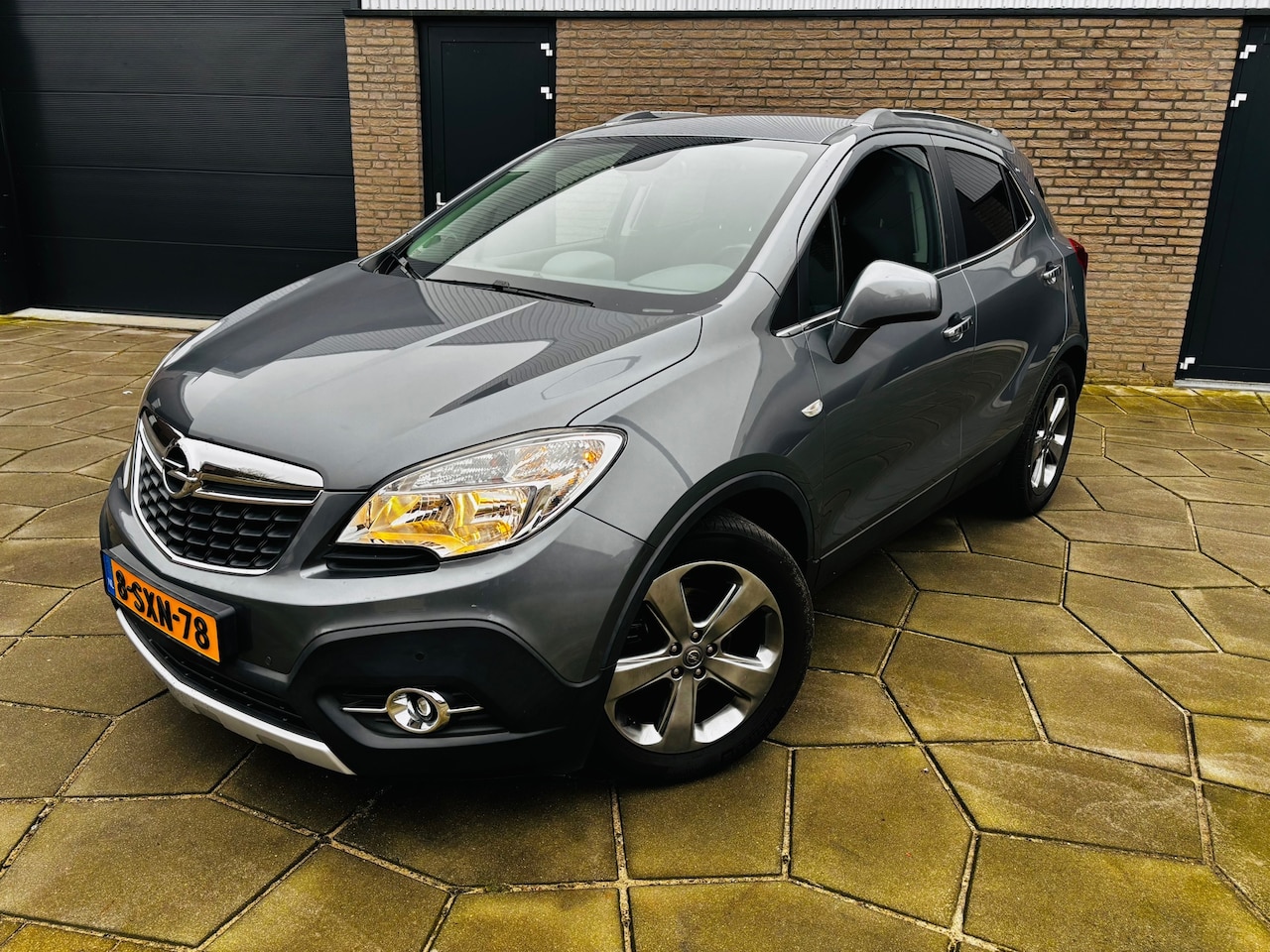 Opel Mokka - 1.6 Cosmo|Trekhaak |Half leder |Cruise-Lim.| 18 Inch. lichtm grote wielen - AutoWereld.nl