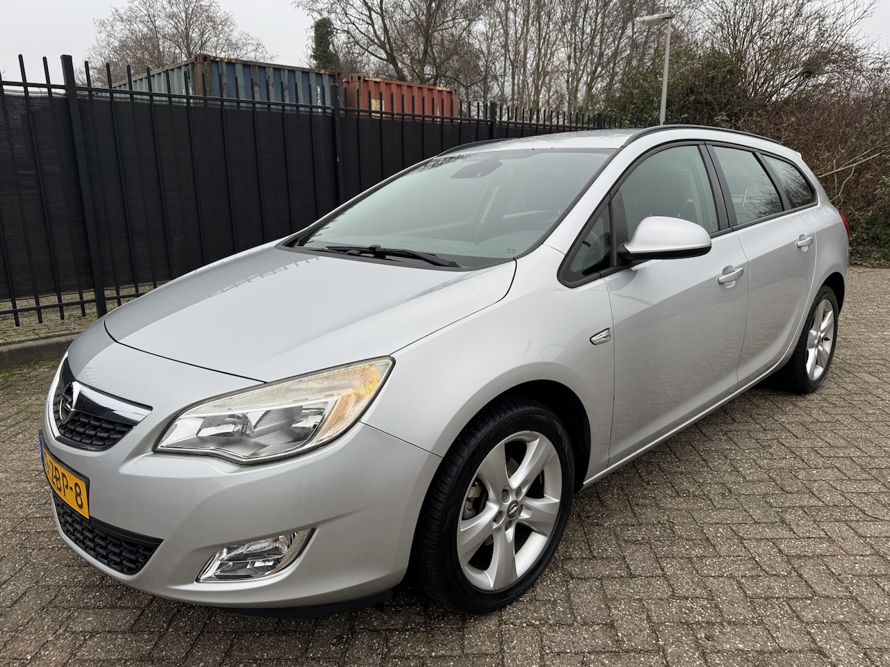 Opel Astra Sports Tourer - 1.4 Turbo 6 Vern Sport Clima/Cruise/Navi/PDC - AutoWereld.nl