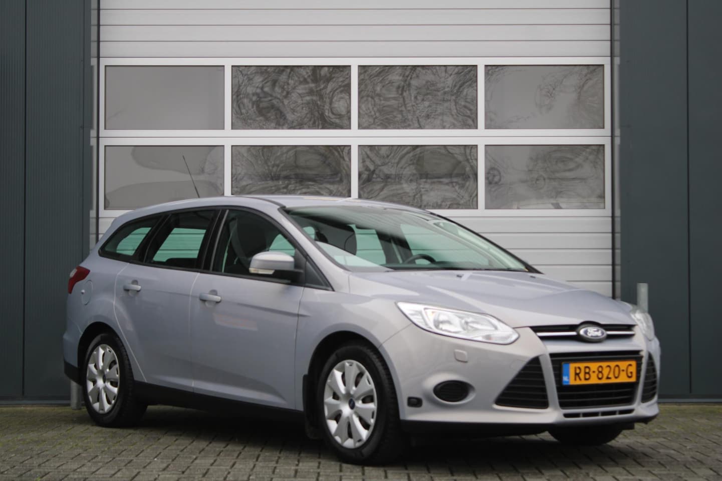 Ford Focus Wagon - 1.6 EcoBoost Lease Titanium Airco/Stoelverwarming/Radio.CD.AUX.USB/Isofix/Trekhaak/Dealero - AutoWereld.nl