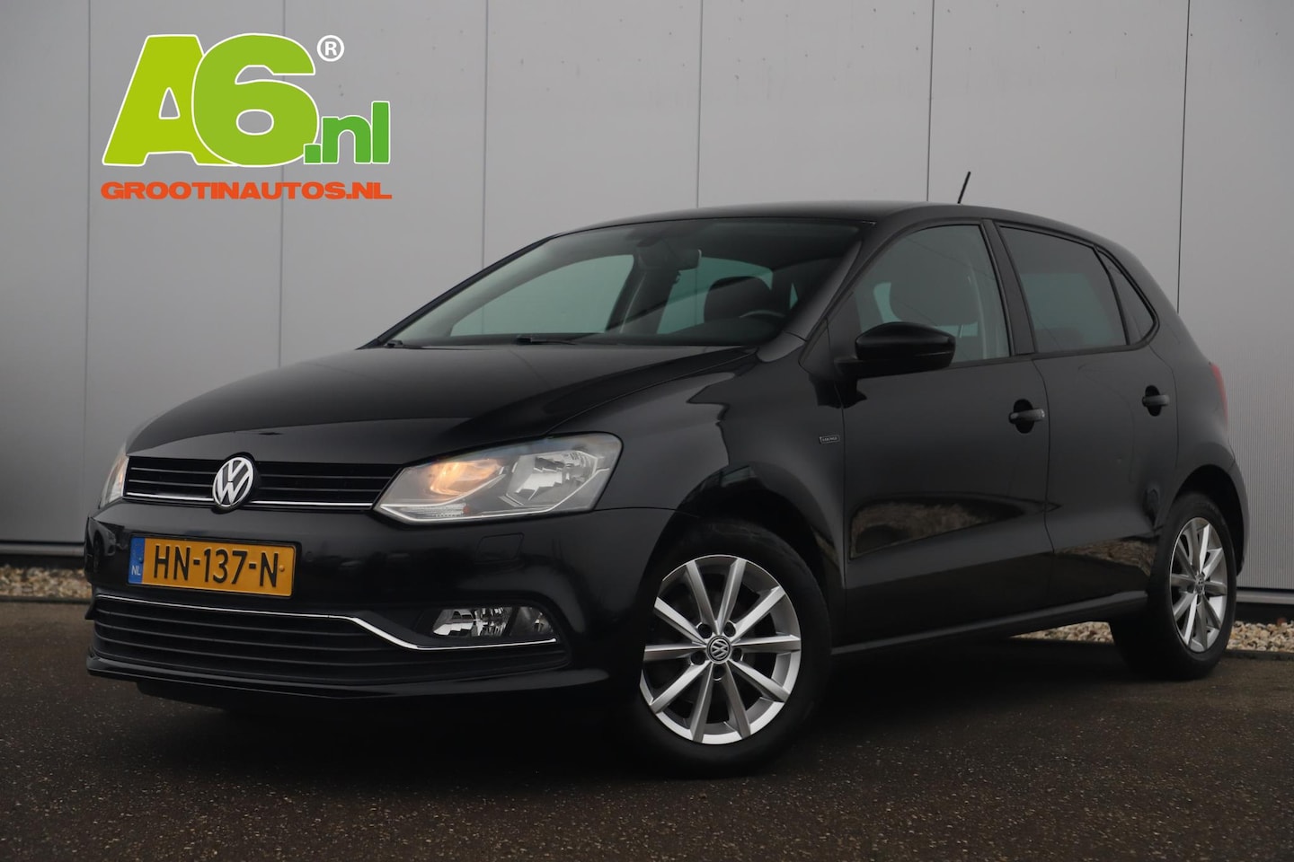 Volkswagen Polo - 1.4 TDI Comfortline Lounge 15 inch LMV Navigatie Clima Cruise Bluetooth Getint Glas Parkee - AutoWereld.nl