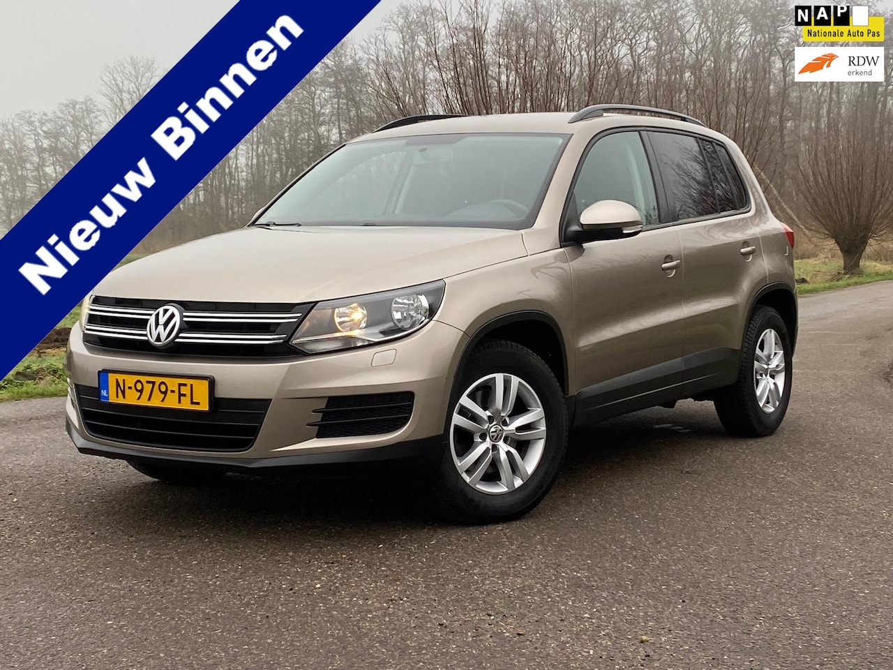 Volkswagen Tiguan - 1.4 TSI Sport&Style 5DRS NAVI PDC STOEL-VERWARMING AIRCO GOED ONDERHOUDEN - AutoWereld.nl