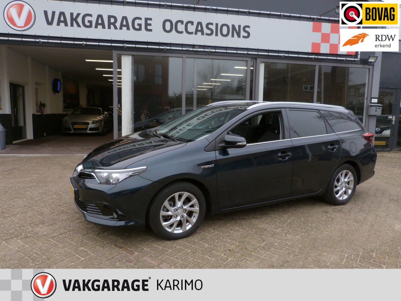 Toyota Auris Touring Sports - 1.8 Hybrid Panorama,navi,xenon,camera - AutoWereld.nl