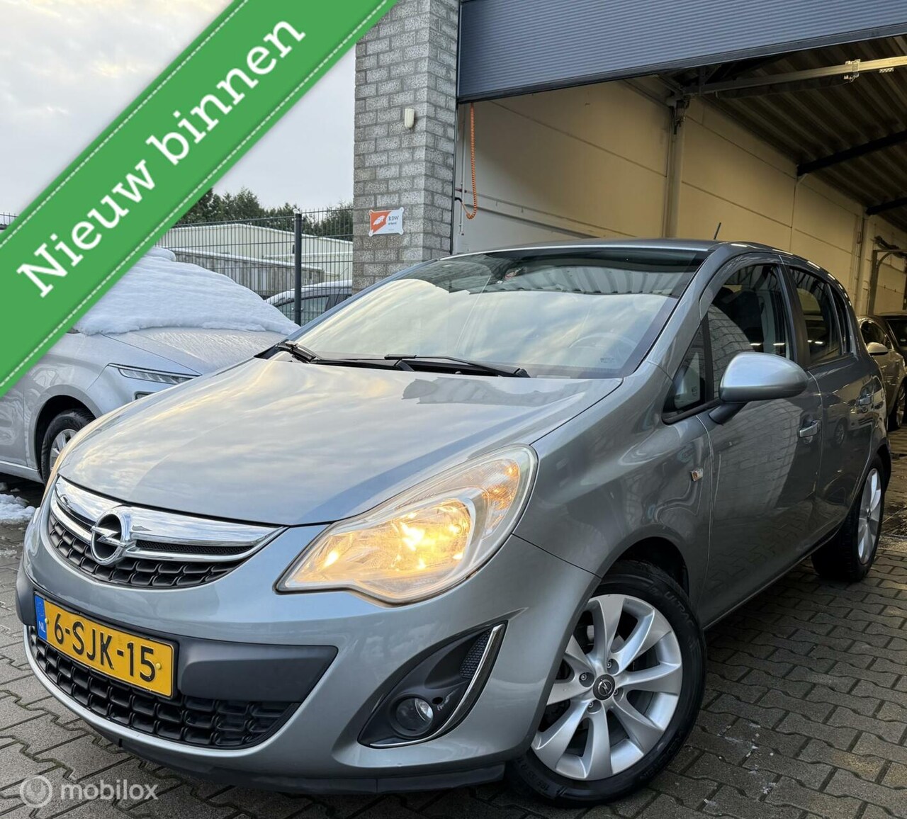 Opel Corsa - 1.2-16V Annivers Edition / 5DRS/136.000KM/BJ 2012 - AutoWereld.nl