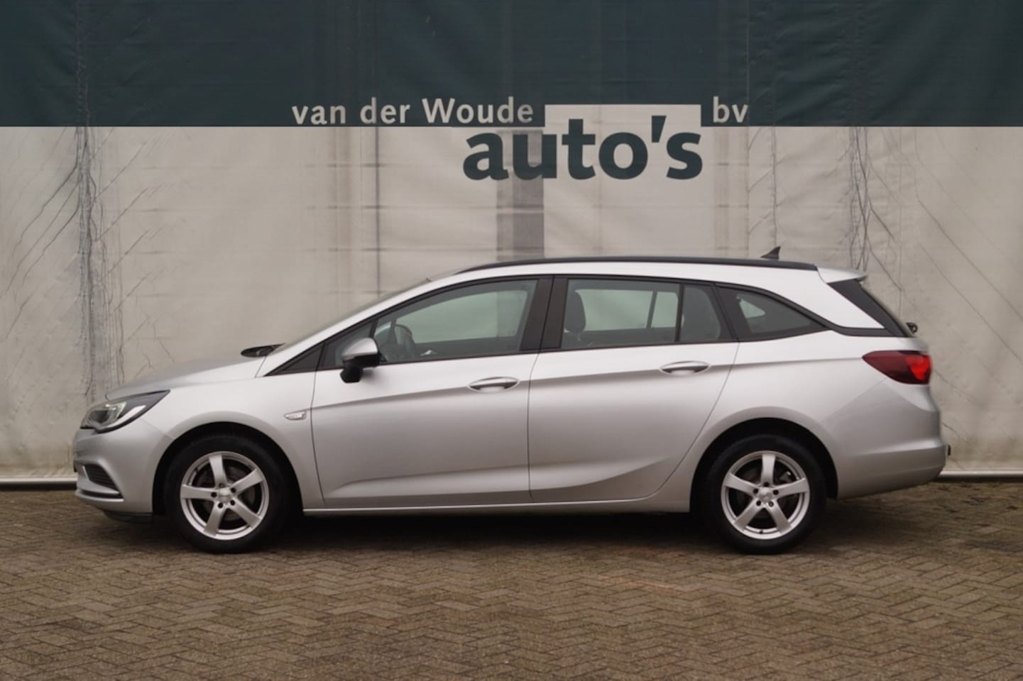 Opel Astra Sports Tourer - 1.0 Turbo Business -NAVI-PDC-AIRCO- - AutoWereld.nl