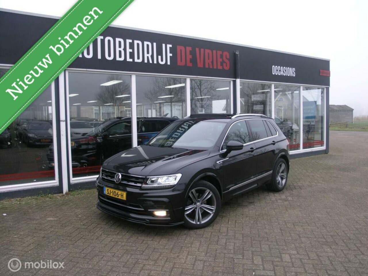 Volkswagen Tiguan - 1.4 TSI R-line Nieuwe motor slechts 20dkm! Zeer complete uitvoering. - AutoWereld.nl