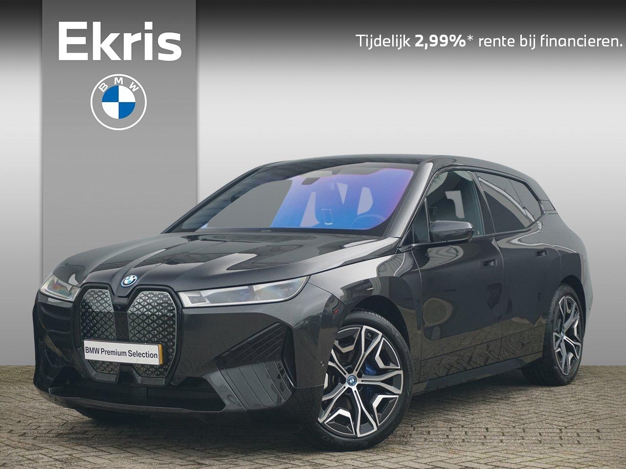 BMW iX - xDrive40 Sportpakket 22'' / Panoramadak / Harman Kardon / Trekhaak - AutoWereld.nl