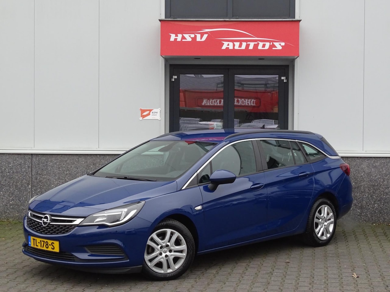 Opel Astra Sports Tourer - 1.6 CDTI Business+ airco navi org NL - AutoWereld.nl