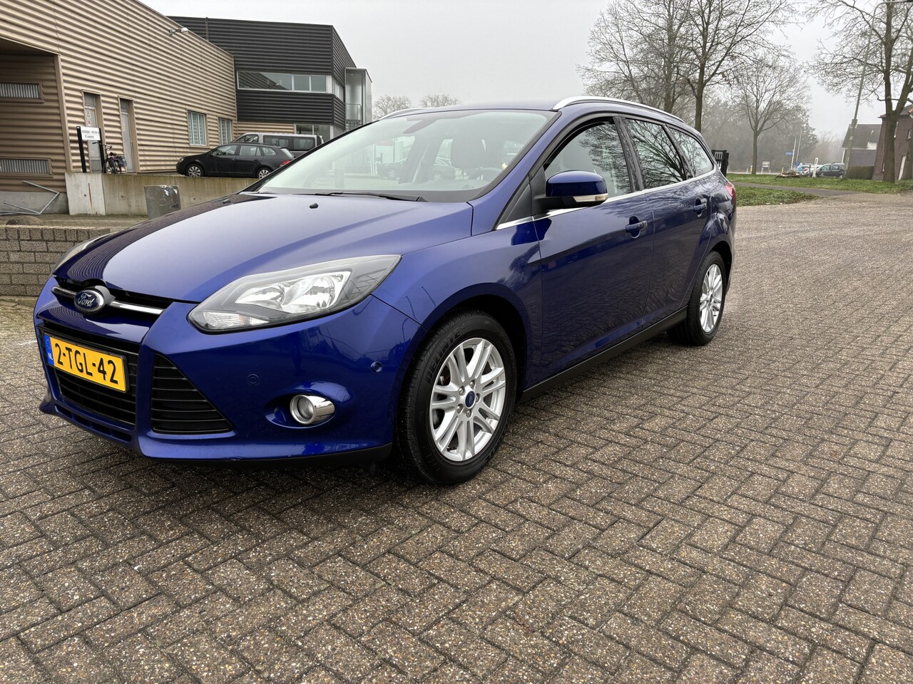 Ford Focus Wagon - 1.0 EcoBoost Edition Plus 125 pk [ fm navi,ecc,cruise,lmv,trekhaak ] - AutoWereld.nl