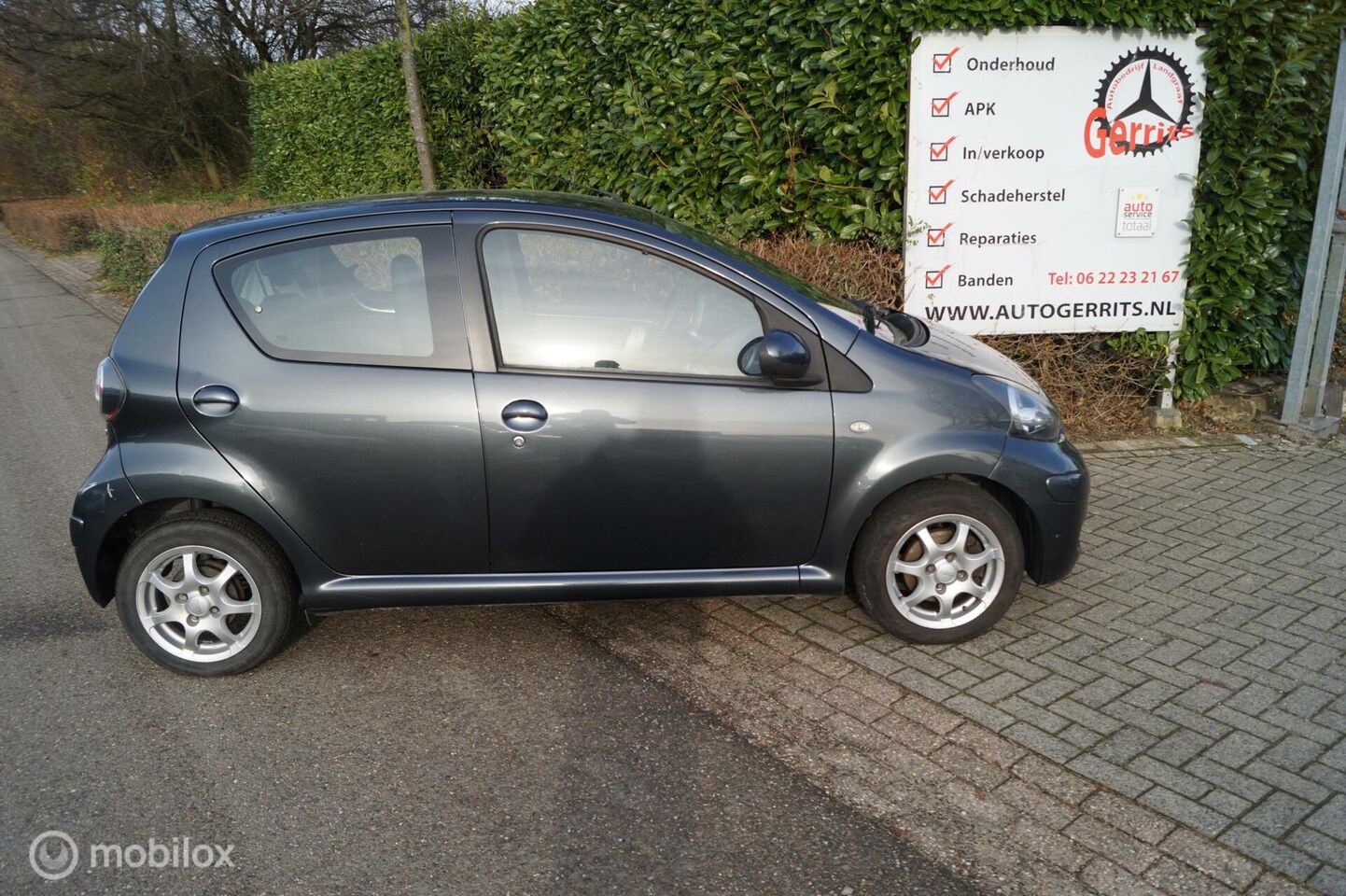 Toyota Aygo - 1.0-12V Dynamic Navigator met airco - AutoWereld.nl