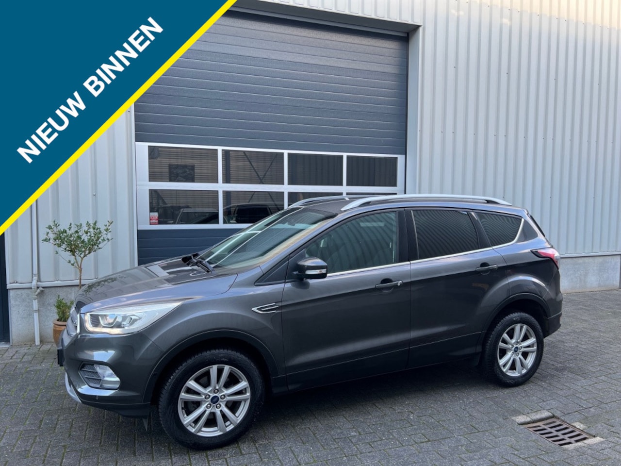 Ford Kuga - 1.5 EcoB. Trend BUSS NAVI CAMERA 17" LM INP. HULP - AutoWereld.nl