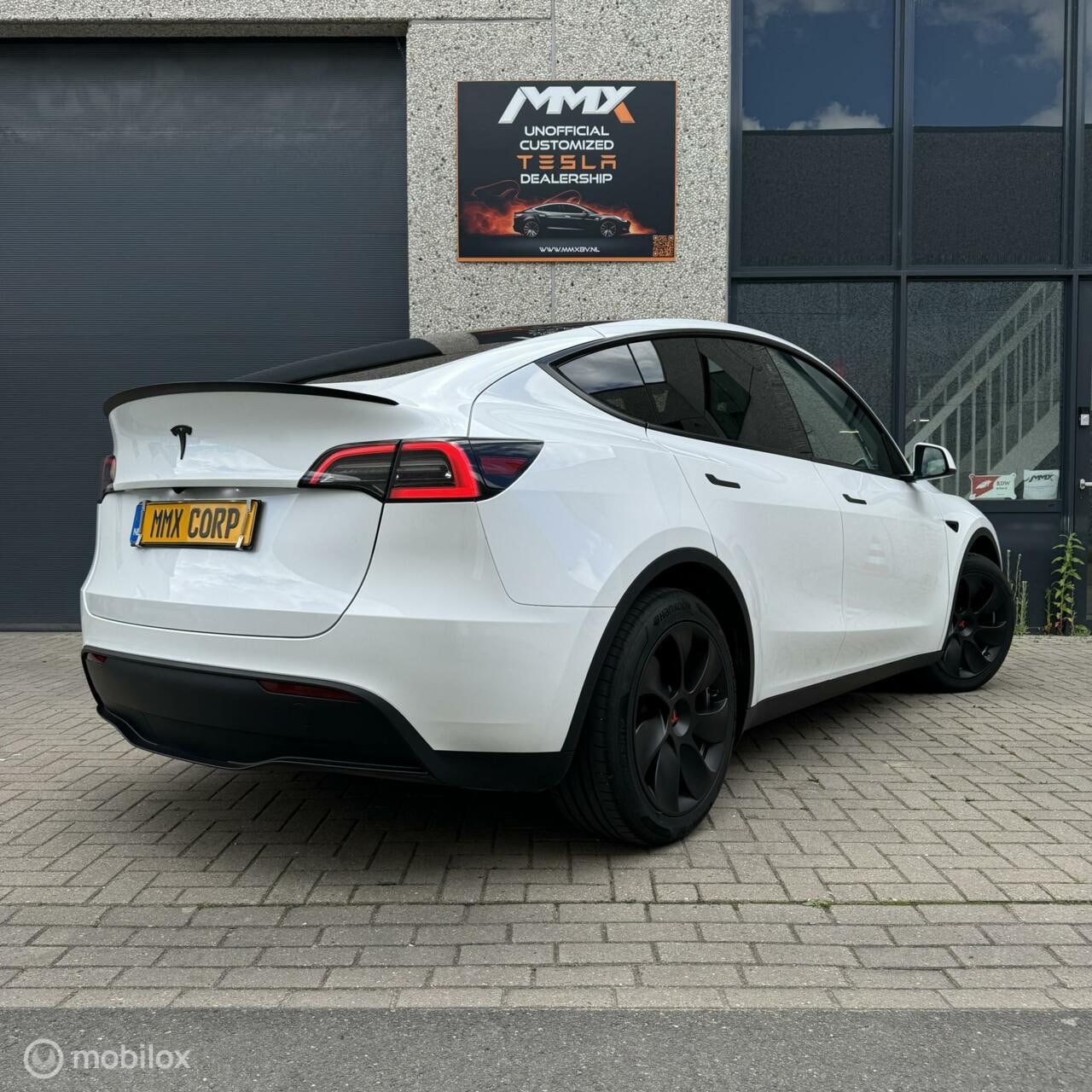 Tesla Model Y - Long range 78kWh MiG AWD wit interieur - AutoWereld.nl