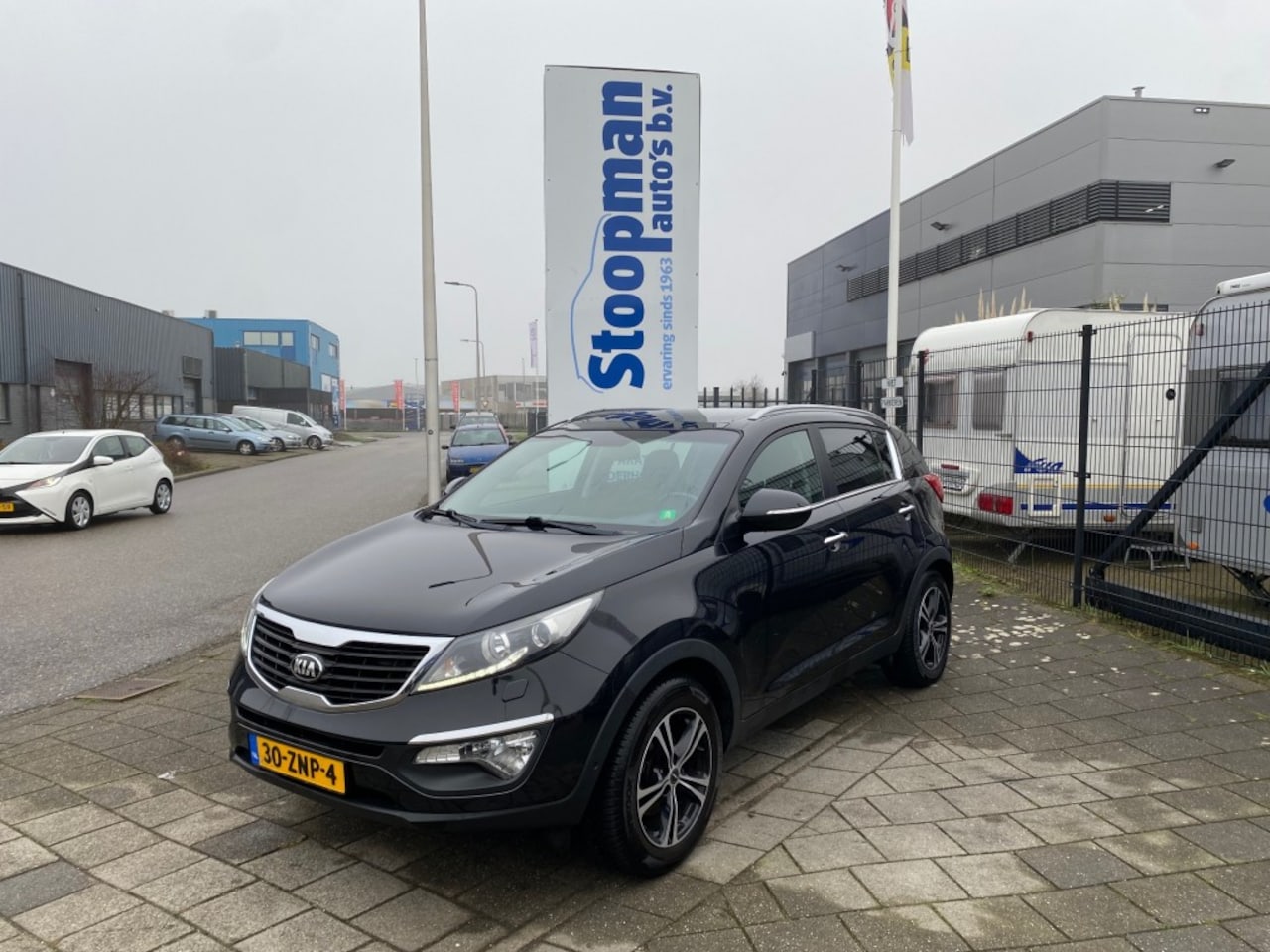 Kia Sportage - 1.6 GDI Super Pack Pano Leder+Stv. Clima Cruise Camera - AutoWereld.nl