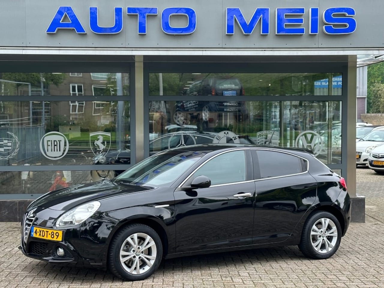 Alfa Romeo Giulietta - 1.4 T Distinctive Lusso Automaat Navi DAB+ Clima Cruise PDC - AutoWereld.nl