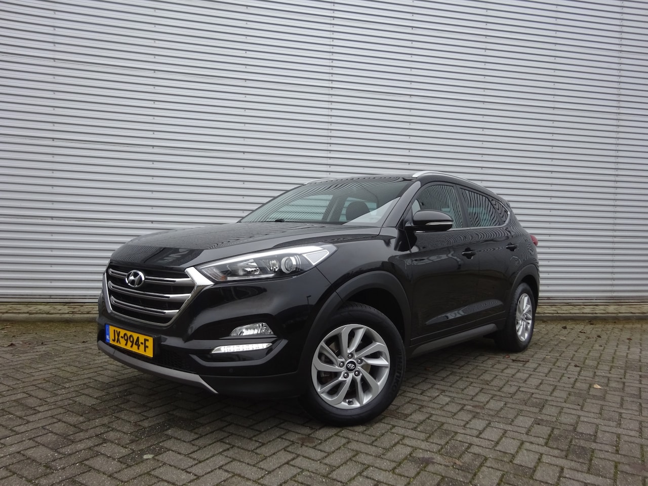 Hyundai Tucson - 1.6 GDi Comfort 1e Eigenaar / Navi / Stoelverw. / Cruise / Trekhaak - AutoWereld.nl