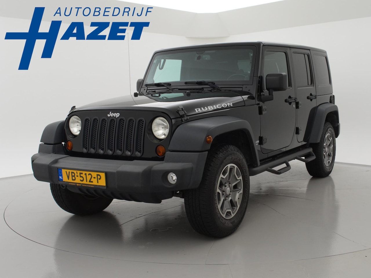 Jeep Wrangler Unlimited - RUBICON 2.8 CRD 200 PK AUT. GRIJS KENTEKEN + APPLE CARPLAY / ALPINE - AutoWereld.nl