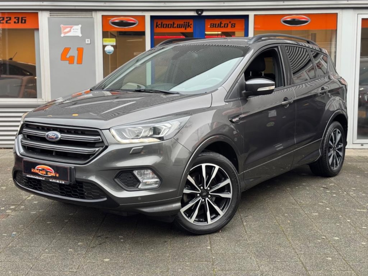 Ford Kuga - 1.5 EcoBoost ST Line Navigatie Camera Elec. Achterklep 1e Eigenaar - AutoWereld.nl