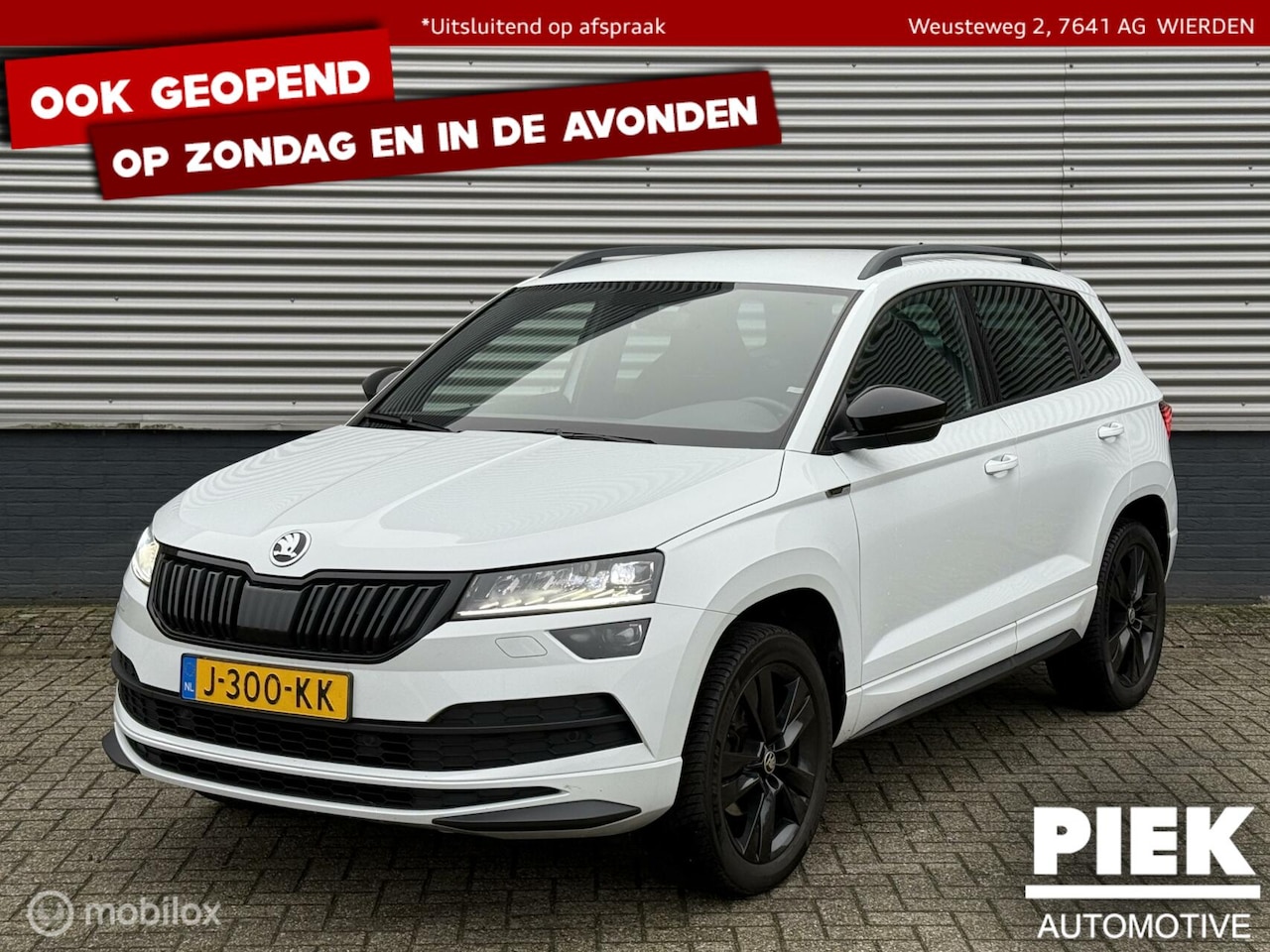 Skoda Karoq - 1.5 TSI ACT Sportline Business TREKHAAK - AutoWereld.nl